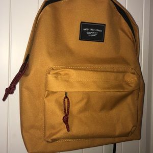 Mustard yellow backpack